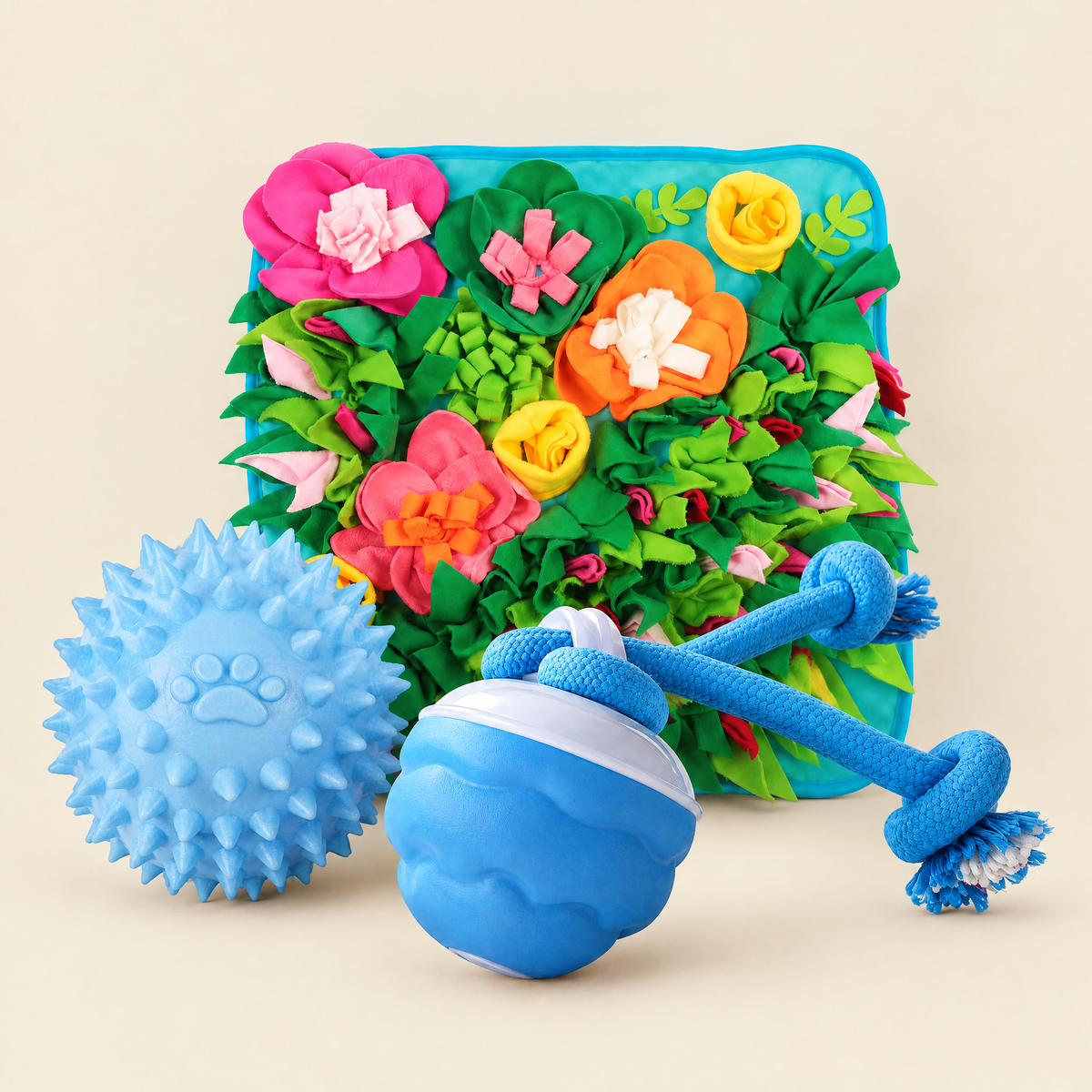 Dog toys: snuffle mat, spiky chew ball and self-rolling ball
