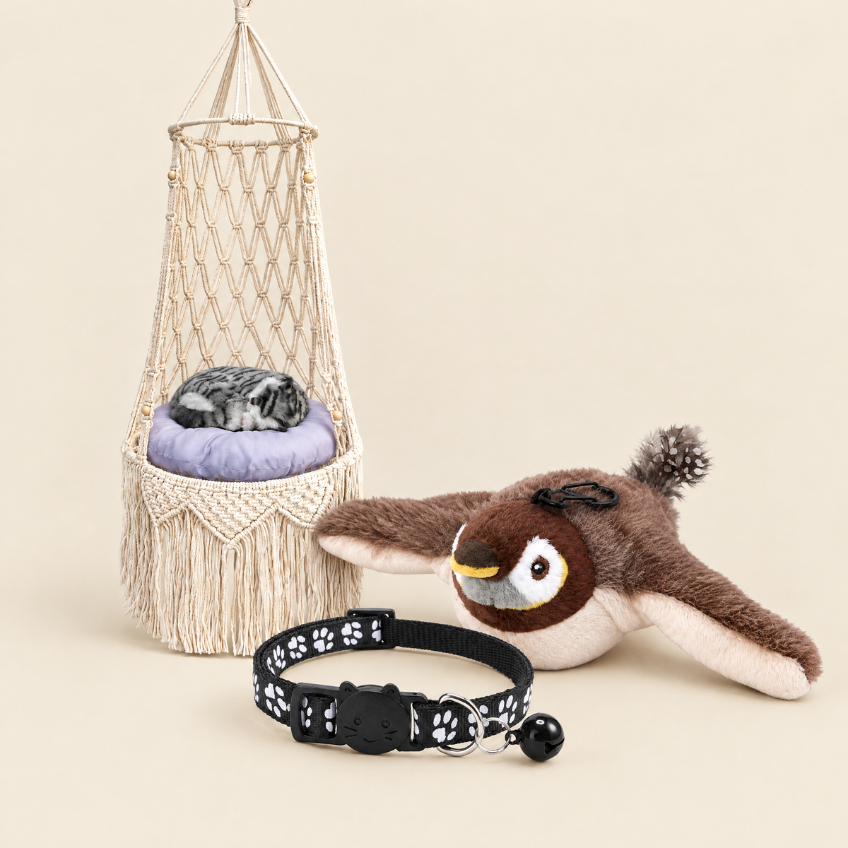 Cat supplies: macrame hammock, bird toy and paw print collar
